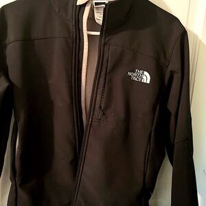 The North Face Black Ski Jacket with High Collar and Slim Fit